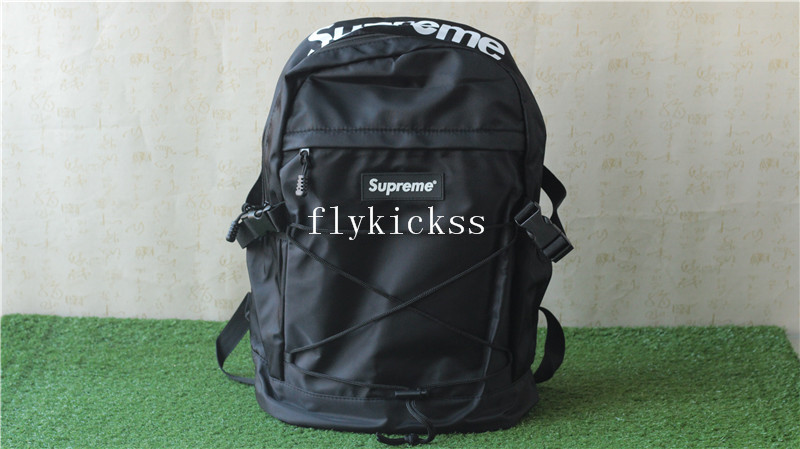 red and black supreme backpack